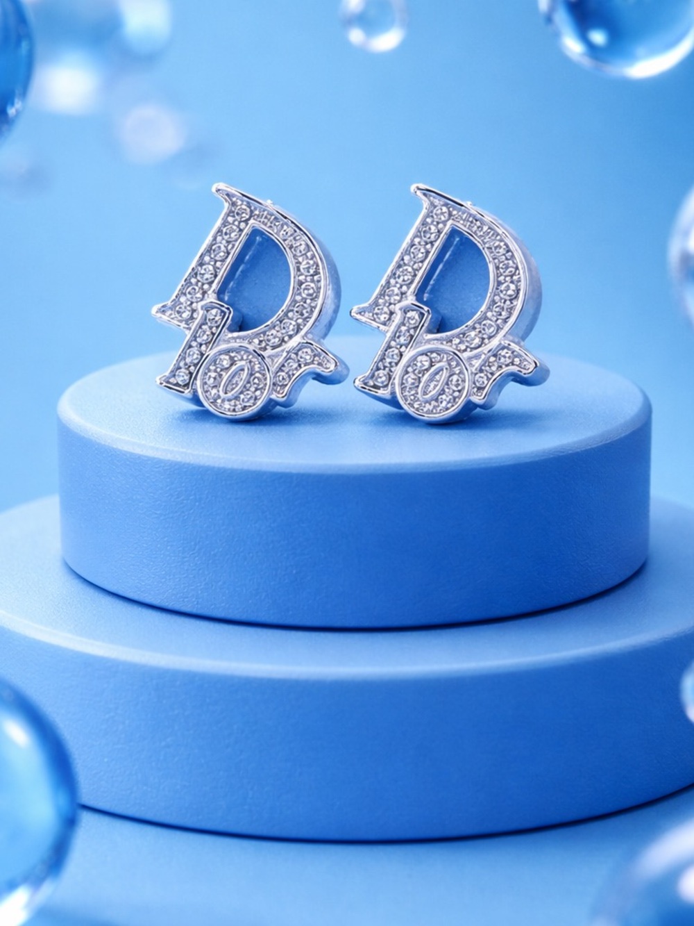 Silver Crystal 'D' Logo Stud Earrings with Blue Accents